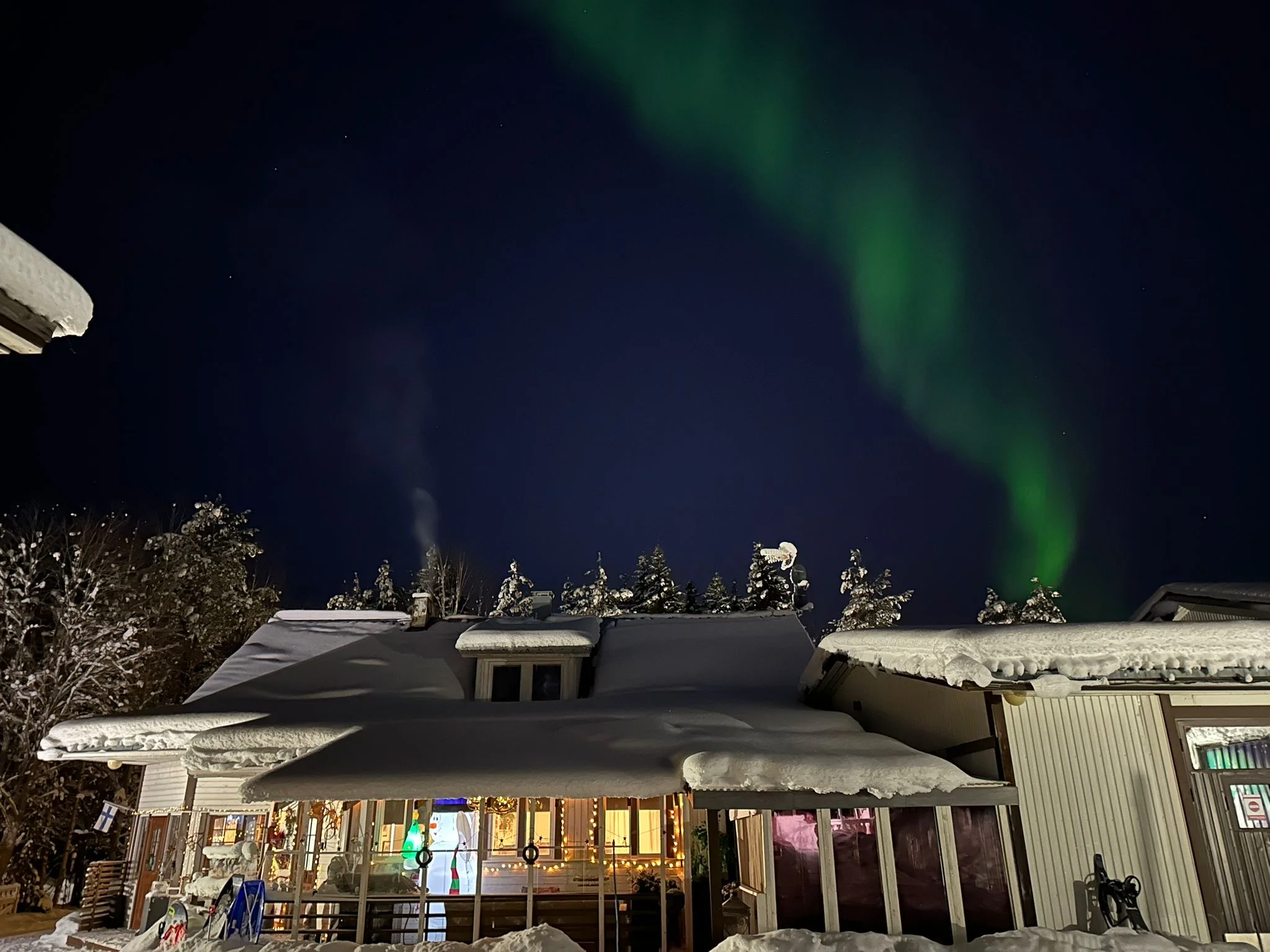 Villa Shaman cabin under the Northern Lights in Rovaniemi
